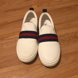 Steve Madden White Slip-On Sneakers with Red and Black Stripes